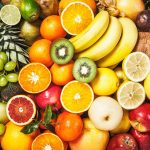 Fresh fruit background. Healthy eating and dieting concept. Winter assortment. Top view